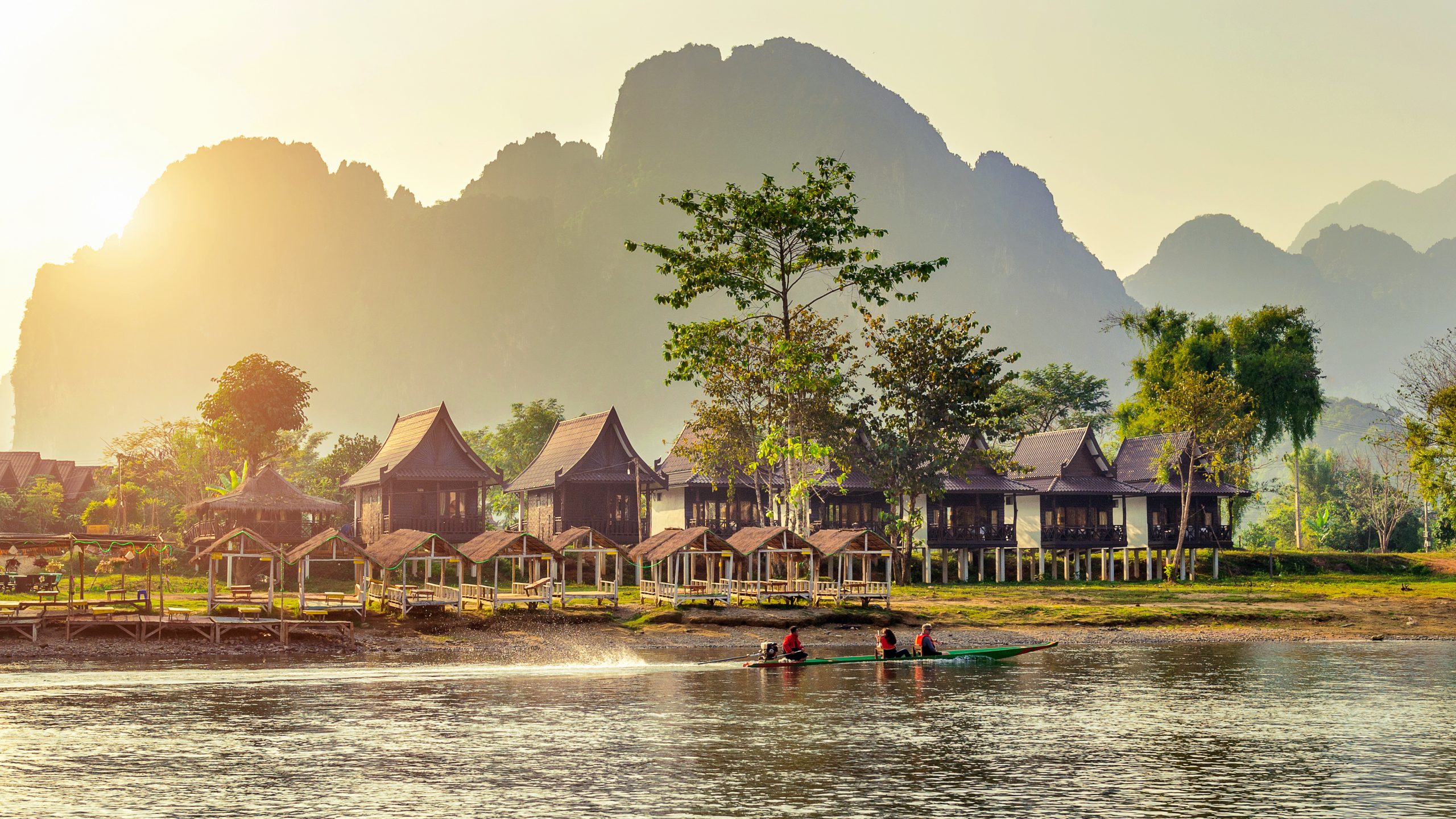Village and bungalows along Nam Song River in Vang Vieng, Laos. - European Chamber of Commerce and Industry in Lao PDR